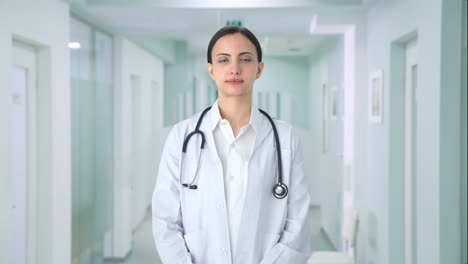 indian female doctor looking at the camera