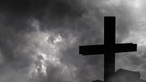 big silhouette cross with thunderstorm background