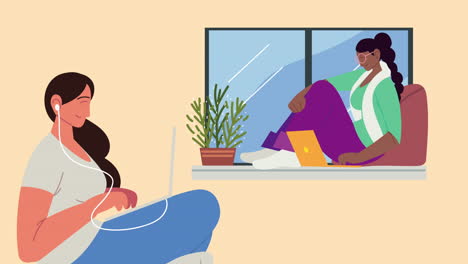 young girls using laptops in the window