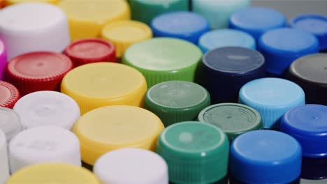 few plastic bottle caps - plastic processing recycling industry