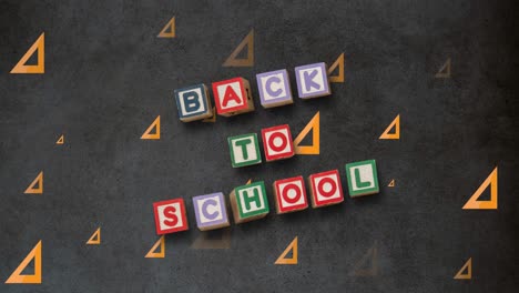 animatie van back-to-school tekst over school items pictogrammen en blackboard