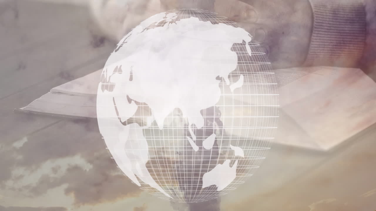 Reading book with animation of transparent globe overlaying cloudy sky in background