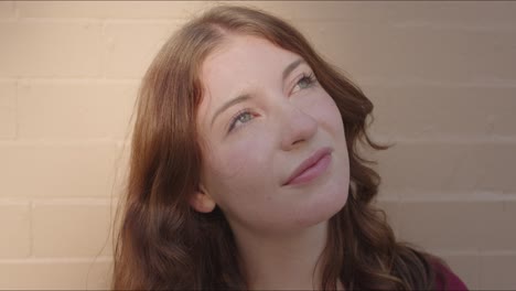 close up of youthful woman's face in the sunlight