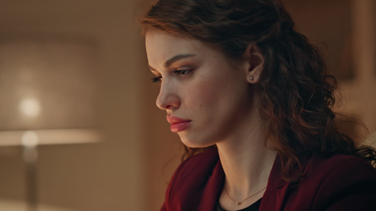 Exhausted entrepreneur worried problem looking laptop at dark workplace close up