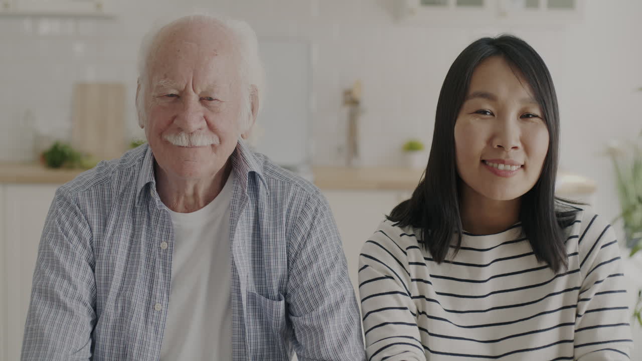Portrait of a Senior Man and Young Woman