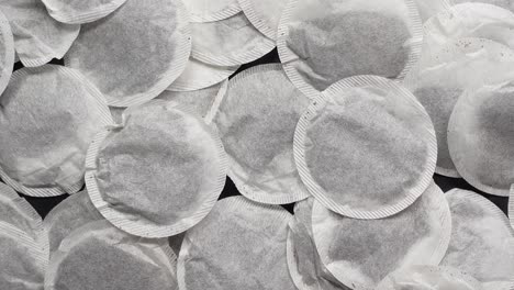 a close up of round tea bags