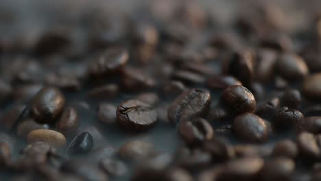 Macro-dolly-shot-of-a-smoke-rises-above-the-coffee-bean