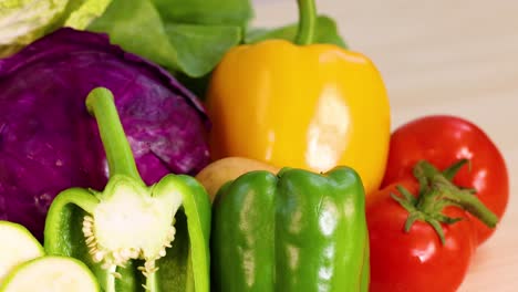 assorted vegetables arranged on a white background