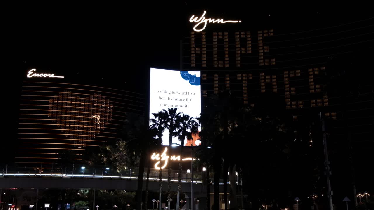 Las Vegas at Night, Wynn Encore Hotel - Casino Billboard With Coronavirus Messages During Lockdown, Nevada USA