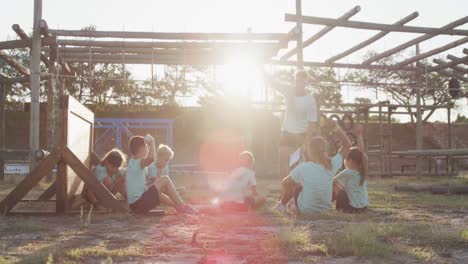 Group-of-Caucasian-boys-and-girls-at-boot-camp-together