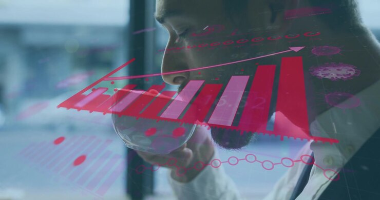 Animation of financial graph over caucasian man drinking coffee