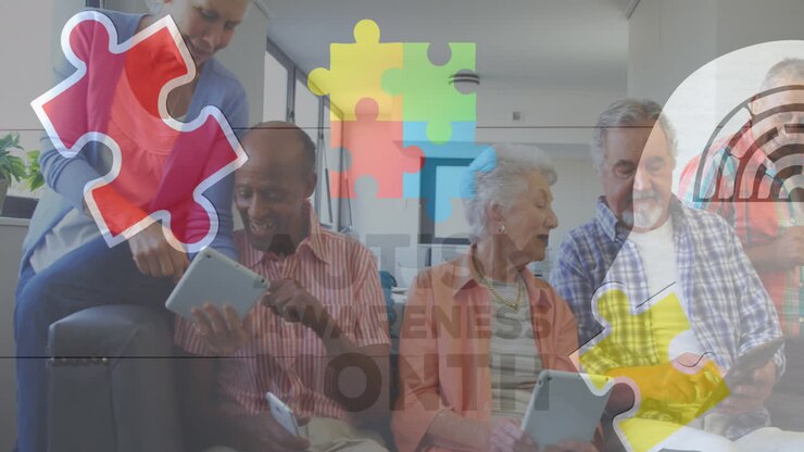 Animazione di pezzi di puzzle colorati e la scritta "autismo" sopra amici anziani che usano tablet