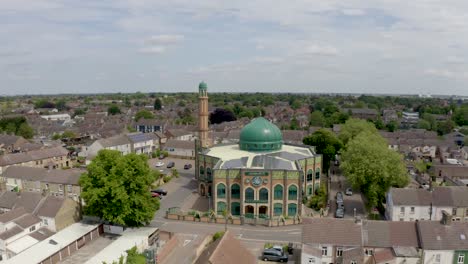 4k aerial footage of at the exterior of a british muslim mosque in a uk city