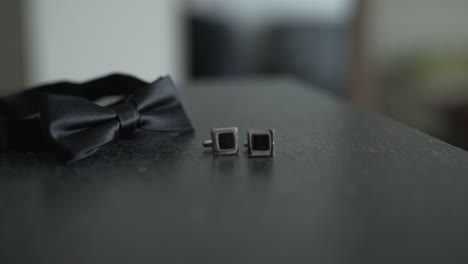 grooms shoes and bow tie on wedding day