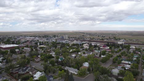 aerial cut bank city neighborhood area landscape during bright cloudy day