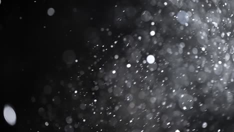 bokeh de partículas abstractas flotantes sobre fondo oscuro