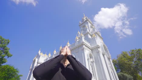 Christian-person-praying-in-church.