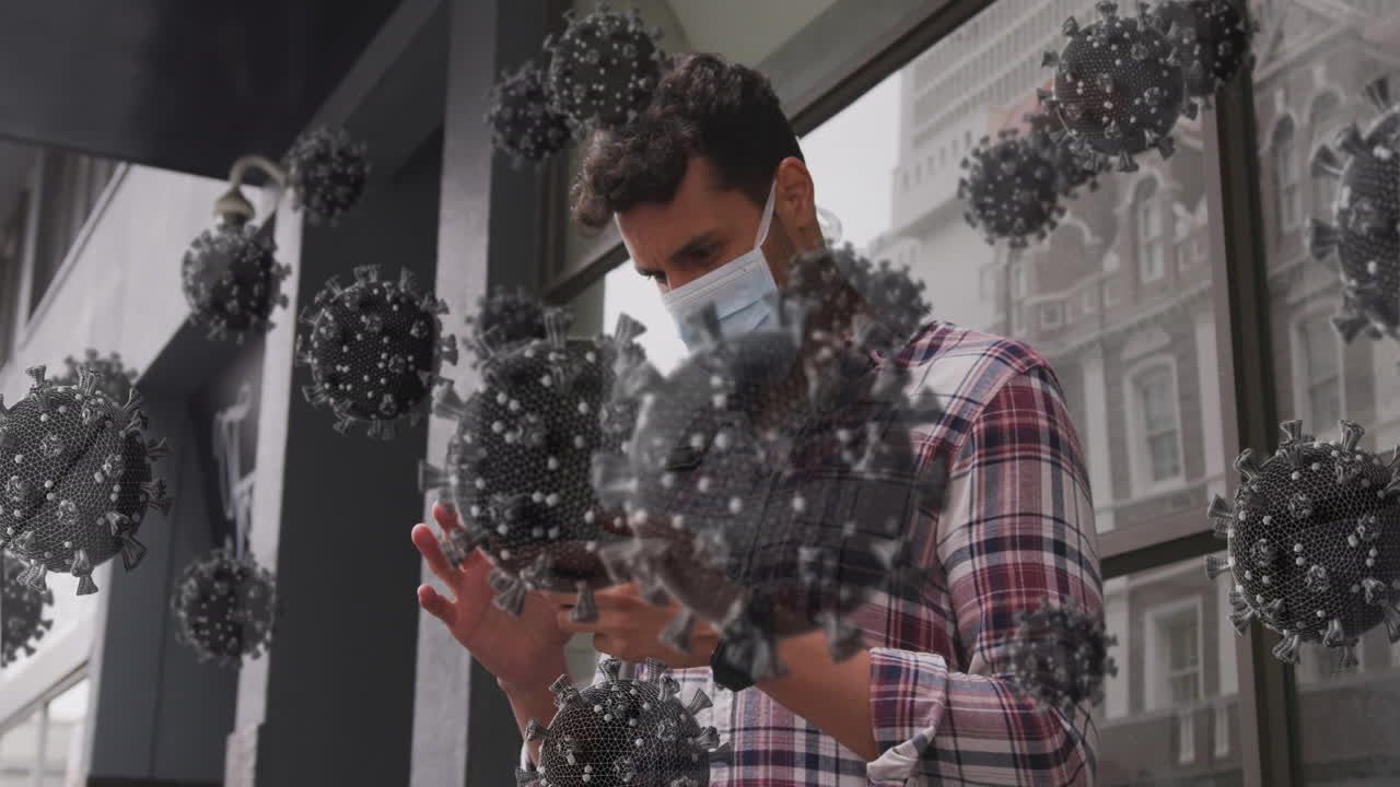 거리에서 얼굴 마스크를 쓰고 있는 라틴인 남성 위의 바이러스 세포의 애니메이션