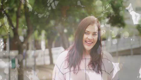 animación de puntos de luz sobre una mujer caucásica sonriente en una calle de la ciudad