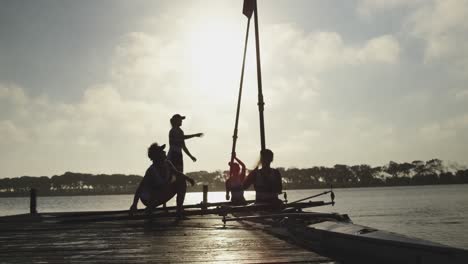 female rowing team training on a river