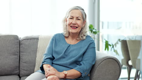 face, senior woman and smile on sofa in home to