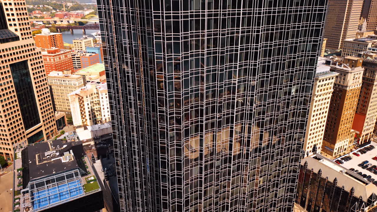40-story office building in Pittsburgh, Pennsylvania with a unique design. Watching the stunning façade of One PPG Place from drone