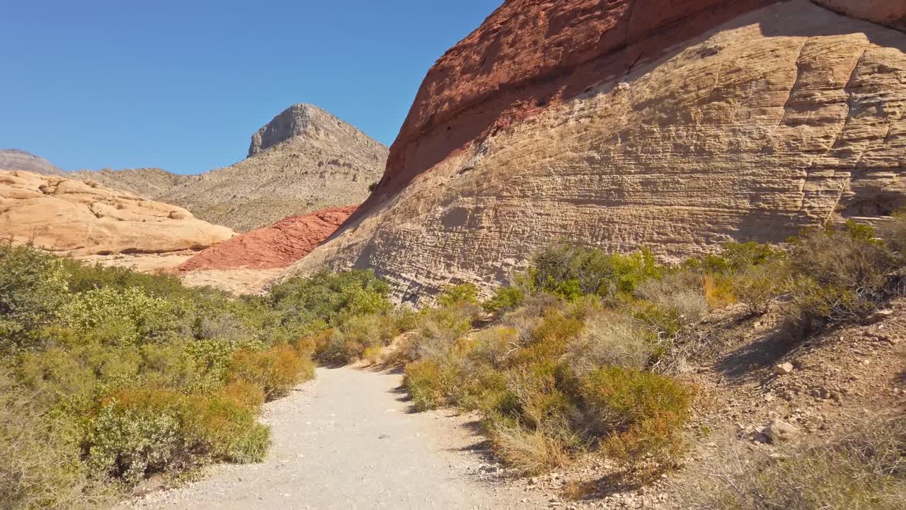 Deserted road among big sandstone in Nevada