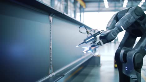advanced robotics: precision welding operation enhances manufacturing efficiency with automated robotic arm technology in high-tech industrial setting