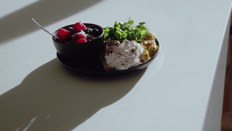 Crane-Shot-Healthy-Breakfast-Plate-Beautifully-Served-And-Decorated-On-White-Plate