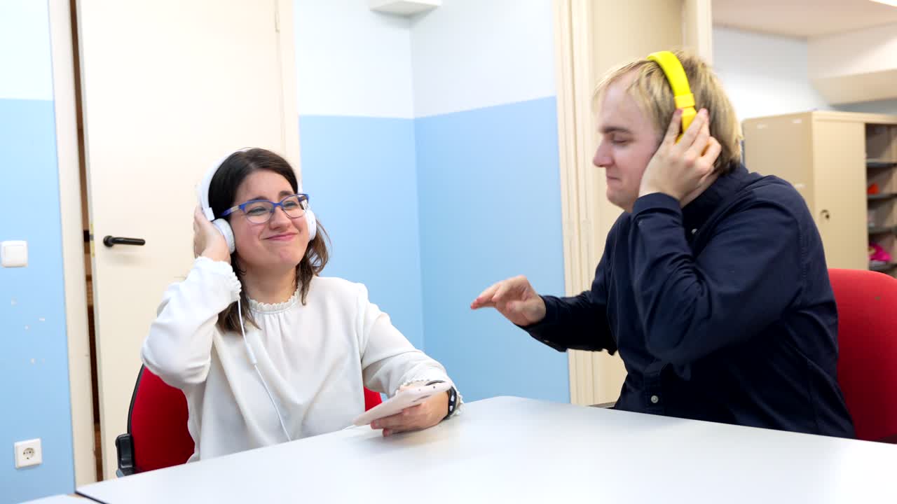 People listening to music with headphones