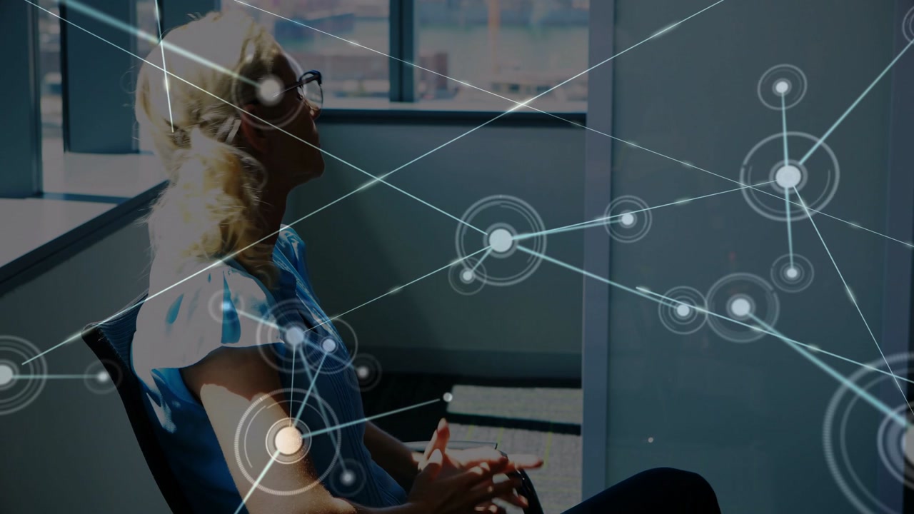 Woman noticing network overlay appearing near shoulder, lowering hand, leaning back, gaining focus