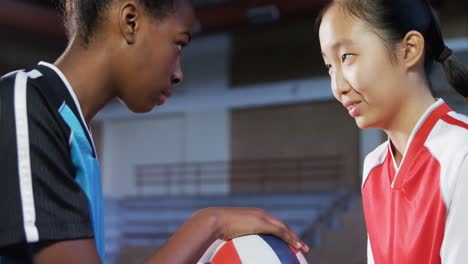 volleyball players standing face to face with volleyball 4k
