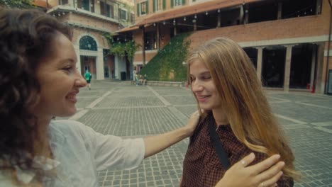 mother and daughter bonding in italian square