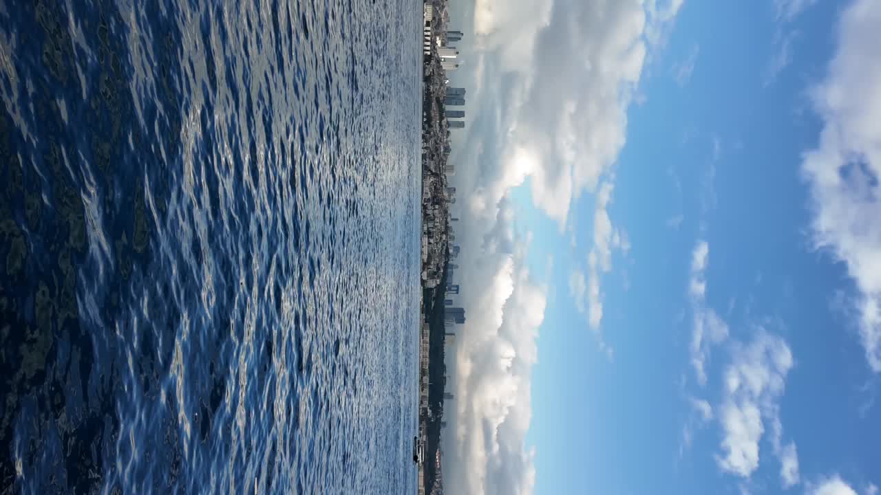 Coastal Cityscape with Ocean and Sky