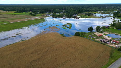aerial view of flooded farmland and village