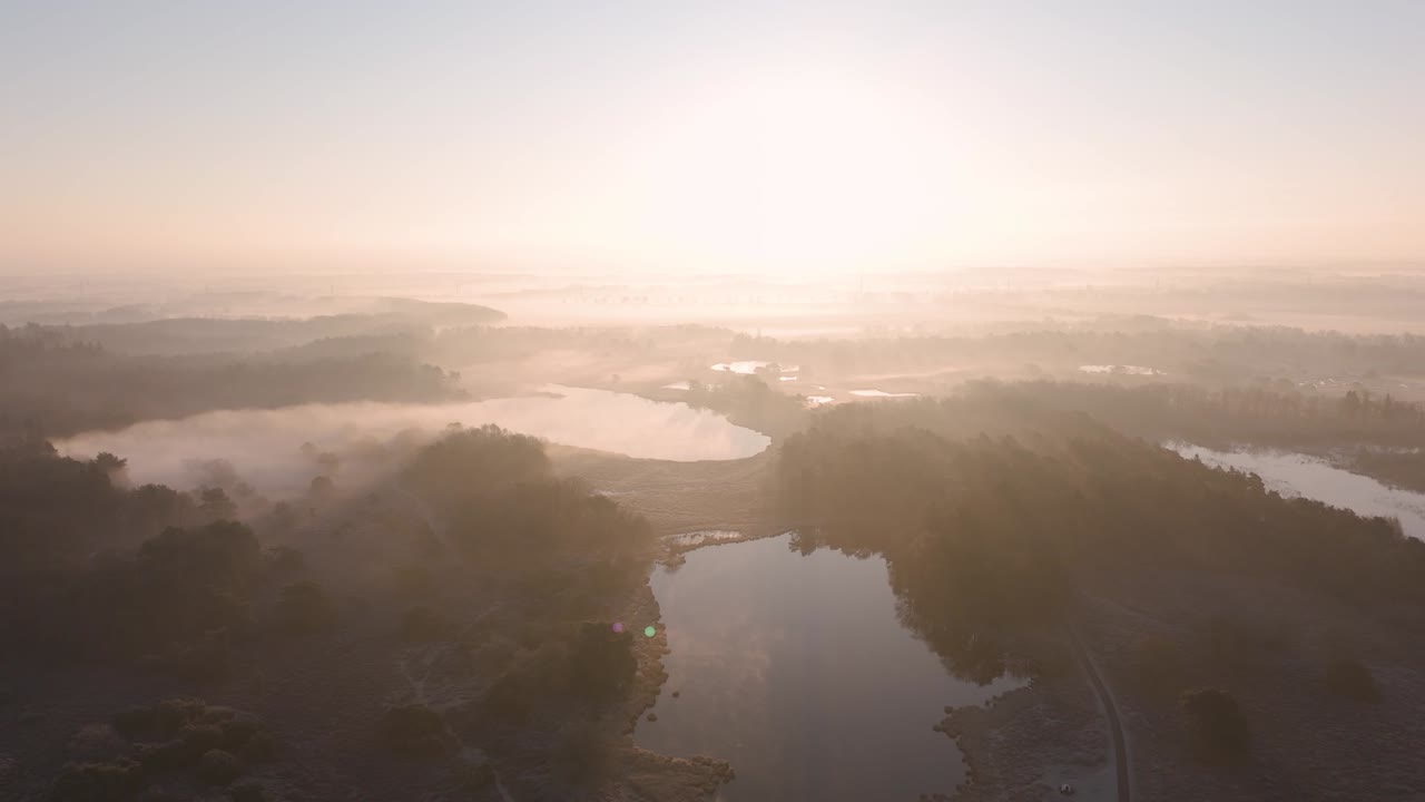 Misty Sunrise over Wetlands