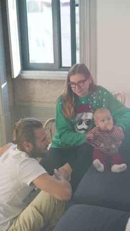 family enjoying a christmas moment at home