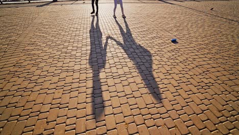 couple dancing in the street. close up view of couple dancing feet in city