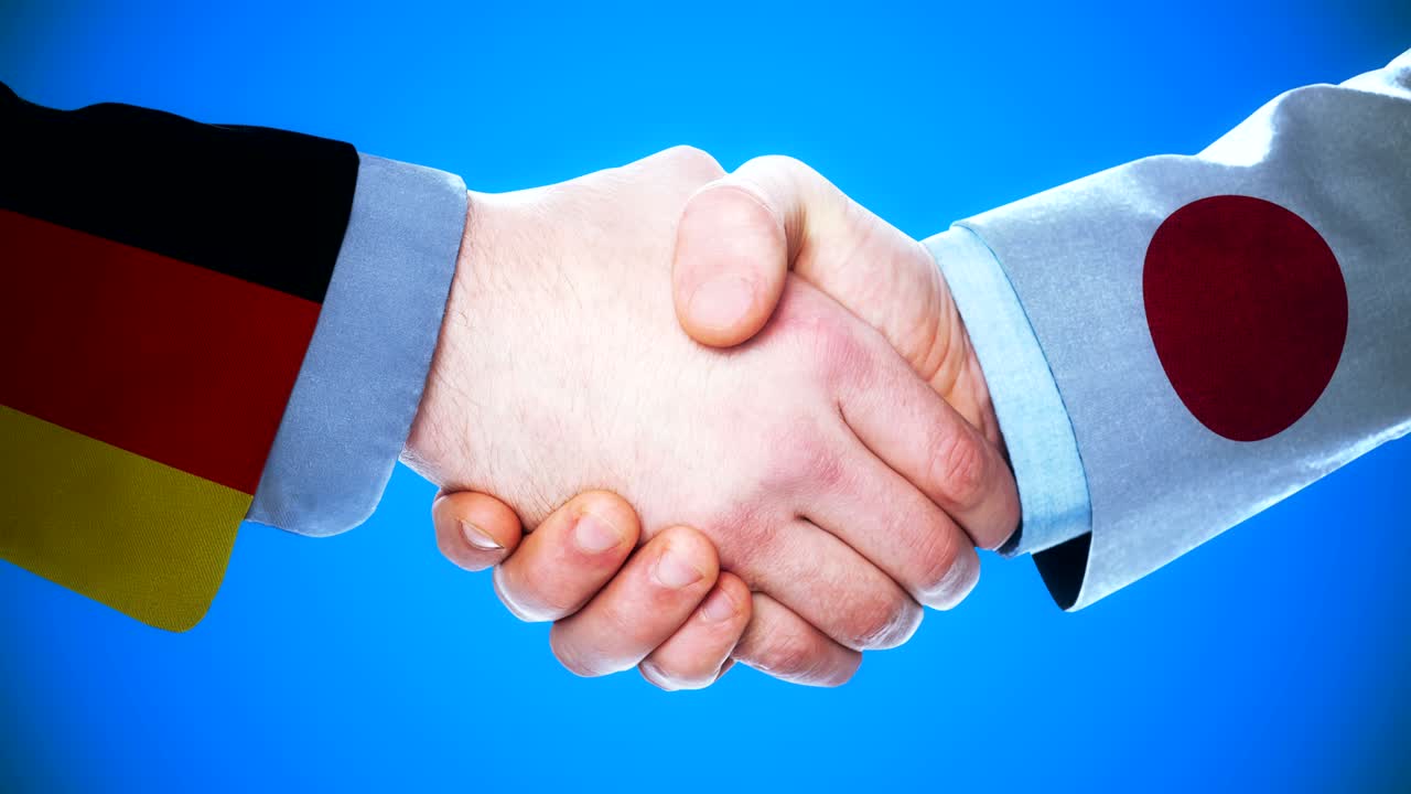 Germany - Japan / Handshake concept animation about countries and politics / With matte channel