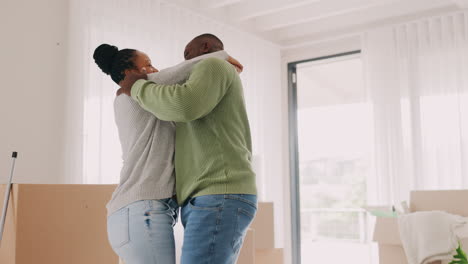 Black-couple,-moving-in-and-dancing-to-celebrate