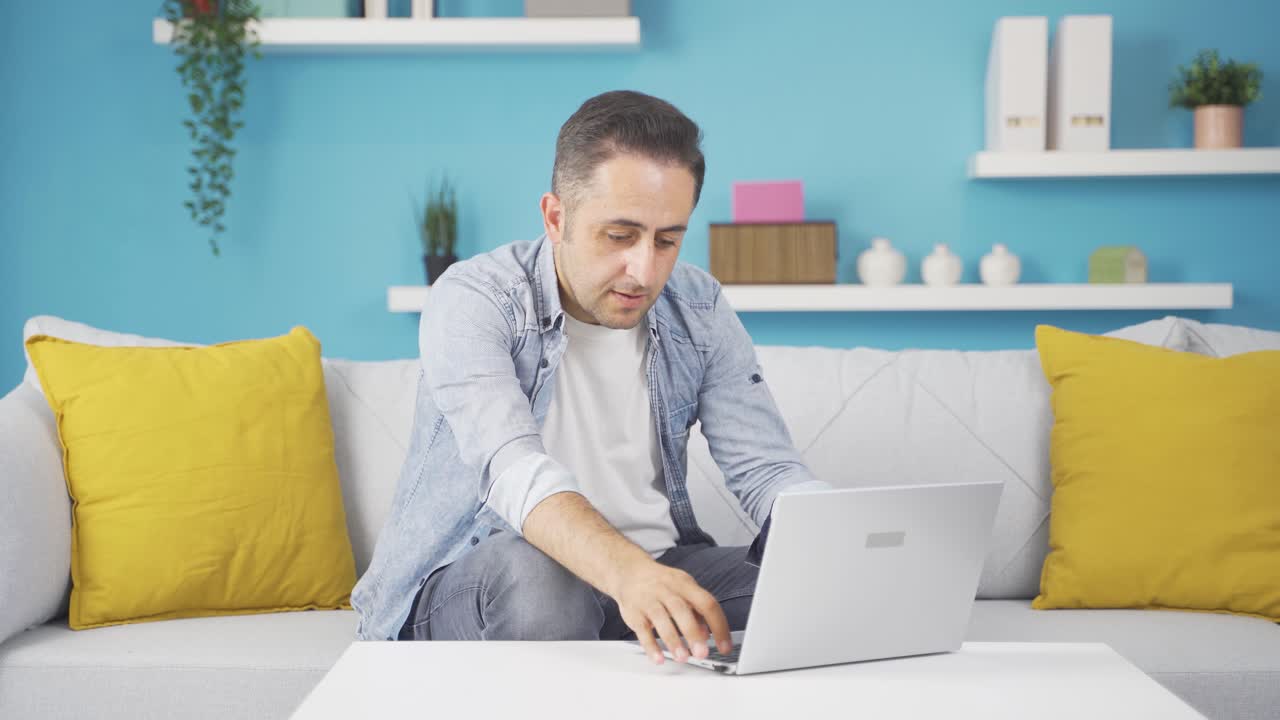 The man who can't use the application on the laptop.