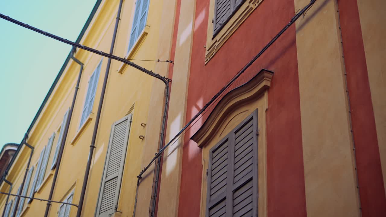 Colorful Building Facade with Shutters