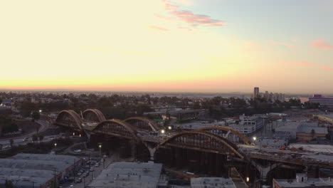 Establishing-drone-shot-of-a-large-bridge-under-construction-in-downtown-Georgia