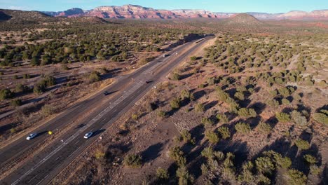 aerial view of traffic on arizona 89a state route, cars on freeway and desert landscape