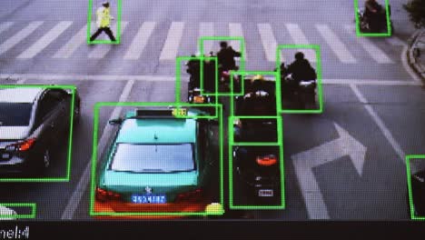 cctv camera. real-time tracking of vehicles and people on the street. authentic pixelated image from a real monitor.