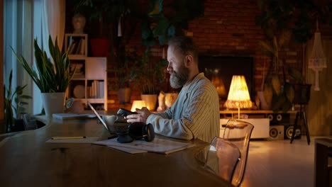 man working from home at night