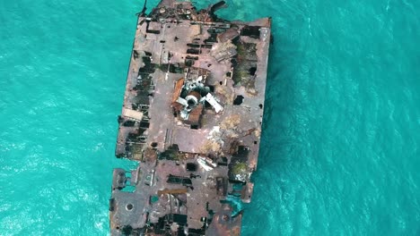 remains of a wrekcage oil tanker in the caribbean sea in san andres island, colombia