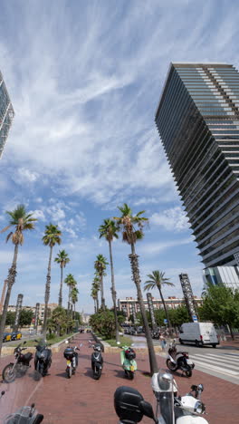 wide angle timelapse of skyscraper buildings in barcelona in vertical