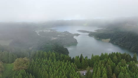 Aerial-view-of-famous-Lagoa-das-Sete-Cidades-with-low-clouds---drone-shot