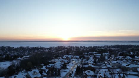 golden hour by the great lakes during winter time and sunset